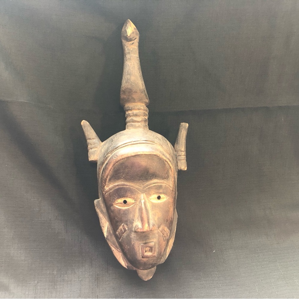 Hand-Carved African Tribal Wooden Mask in Dark Brown
